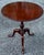 Classic Queen Anne style tilt top tea table. Crafted in solid mahogany with a nicely molded top edge, vase turned...