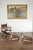 A pair of American painted concrete deer sculptures from the mid 20th century, with weathered patina. Made in the USA...