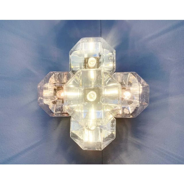 Rare ceiling or wall sconce from the 60s / 70s after a design by Motoko Ishii for the well-known manufacturer Staff...