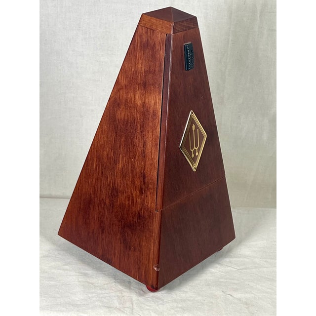 An exquisite vintage Wittner System Maelzel mechanical pyramid metronome, masterfully handcrafted in West Germany. This...