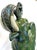 Striking large elephant statue from the 1970's. The Hollywood Regency style piece is made of ceramic with an awesome green...