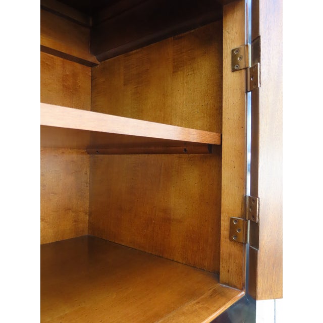 This beautiful Armoire is made out of wood, solid wood, burlwood, veneer, and metal. It was made by Century, and it is...
