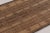 Made with handwoven reed and camel leather in Mauritania circa 1950-1960, this 3x5 vintage Tuareg mat is an exceptional...