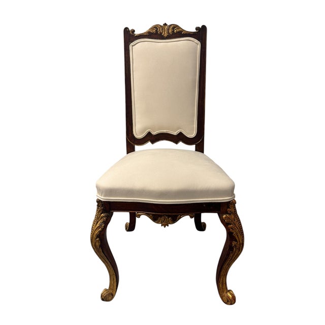 Set of four Louis XV style chairs crafted from carved and gilded wood. They are distinguished by their refined cabriole...