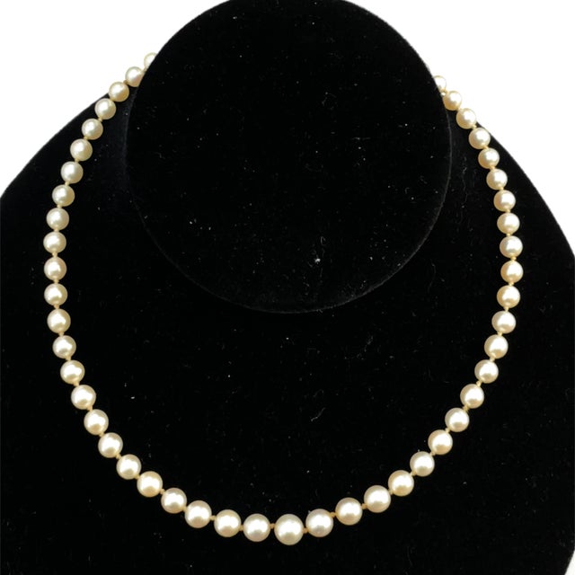 Elevate your elegance with the Mikimoto Vintage Pearl Necklace, a stunning 22-inch piece that beautifully combines classic...
