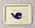 Mid century metal whale tray. Blue cartoon whale on cream background. A great retro nautical New England accent piece....