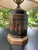 Vintage Frederick Cooper table lamp featuring a striking hexagonal Chinoiserie body finished in black with intricate gilt...