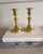 A classic pair of solid brass candlesticks by Baldwin, marked Forged in America. Featuring a timeless turned silhouette...
