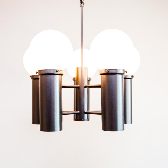 Newly restored five arm chandelier by The Feldman Company, made in Los Angeles c. 1950s. The chandelier offers diffused...
