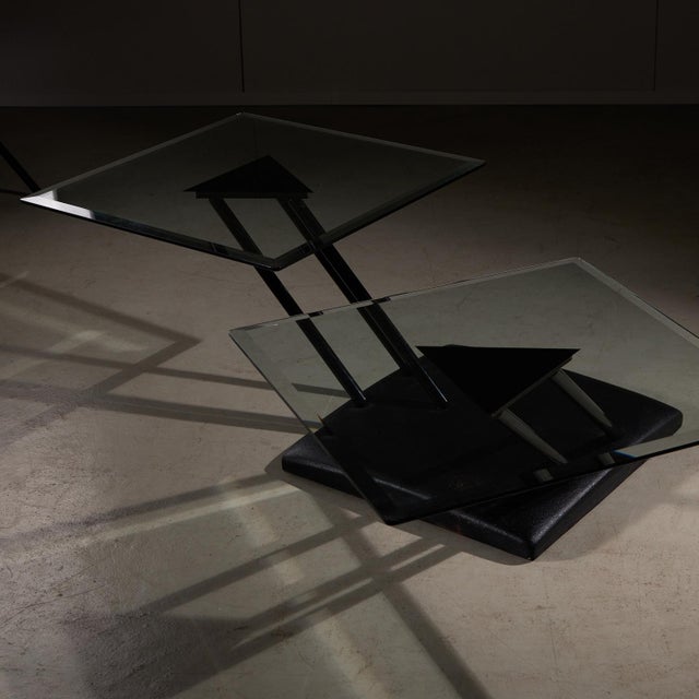 Discover a stunning piece of Italian post-modern design: a striking heavy coffee table from the vibrant 1980s, crafted for...