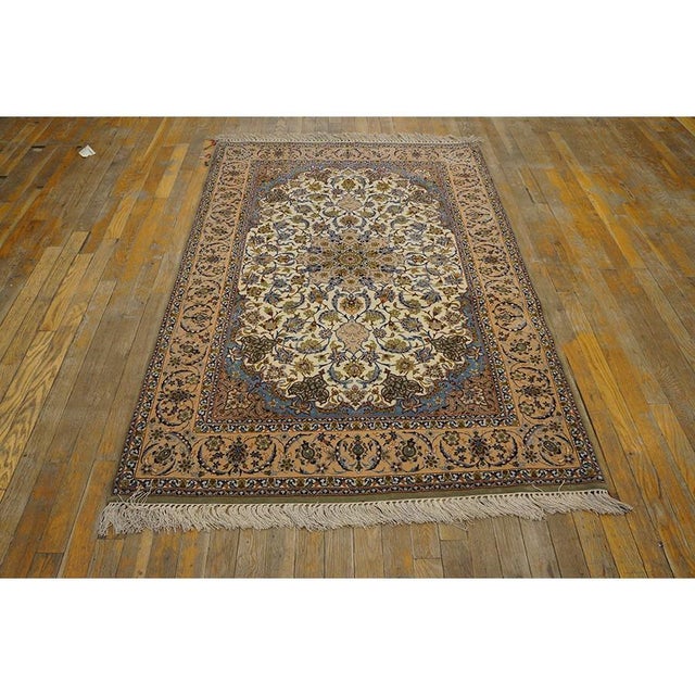 This exceptional 1940 Antique Isfahan Silk Persian Formal rug is a highly refined masterpiece originating from the...