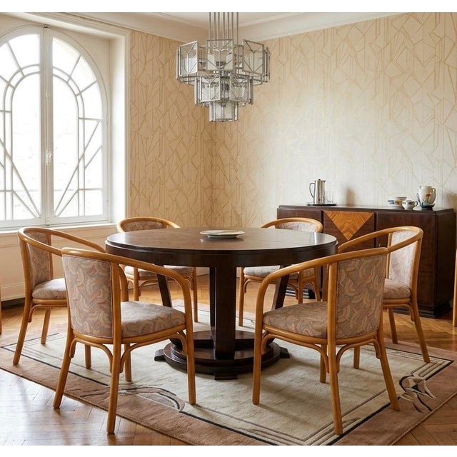 Rare set of six armchairs from the renowned French manufacturer Baumann (see photo). with their iconic enveloping bentwood...