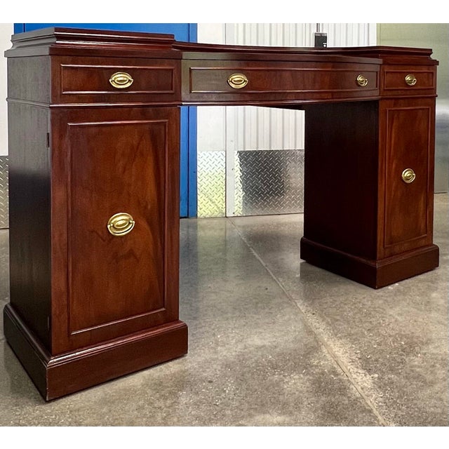 Great vintage 1940’s Georgian style Mahogany double pedestal sideboard. Large bowfront center drawer flanked on each side...