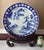 This impressive antique Japanese porcelain charger or platter features a beautifully hand-painted blue and white landscape...