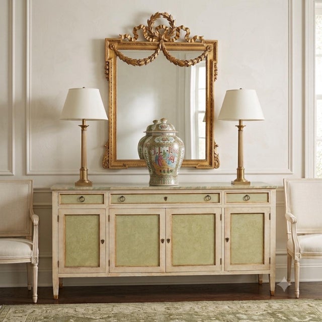 I love this piece! This is an Italian cabinet with French Louis XVI styling. The custom finish includes a faux marble top...