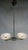 Retro vintage chandelier - lidokov. It has a chrome-plated holder with a distinctive patina. Two light elements of white...