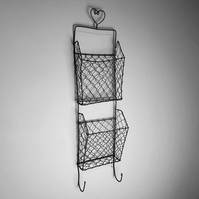 Vintage wire rack to hang on the wall, Japan, 1960s. Dimensions: height 60 cm, width 15 cm, depth 8 cm. This rack has two...