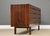 A mid century modern rosewood nine drawer dresser with inset drawer pulls. Professionally refinished. Made in Denmark....