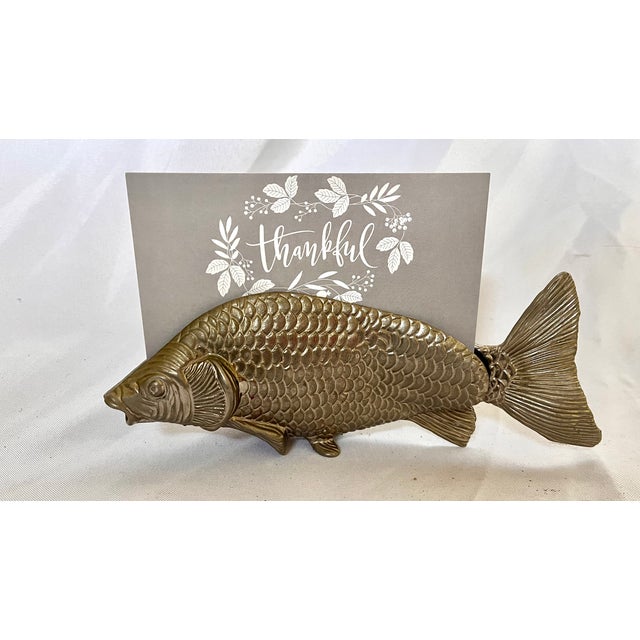 Imported from Italy. Metal letter or card holder. Exquisitely detailed swimming fish design. A unique decorative item. The...