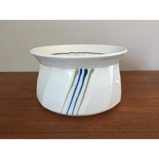 Vintage studio pottery bowl. Signed on bottom by the artist. Great design featuring a simple color palette and sleek...