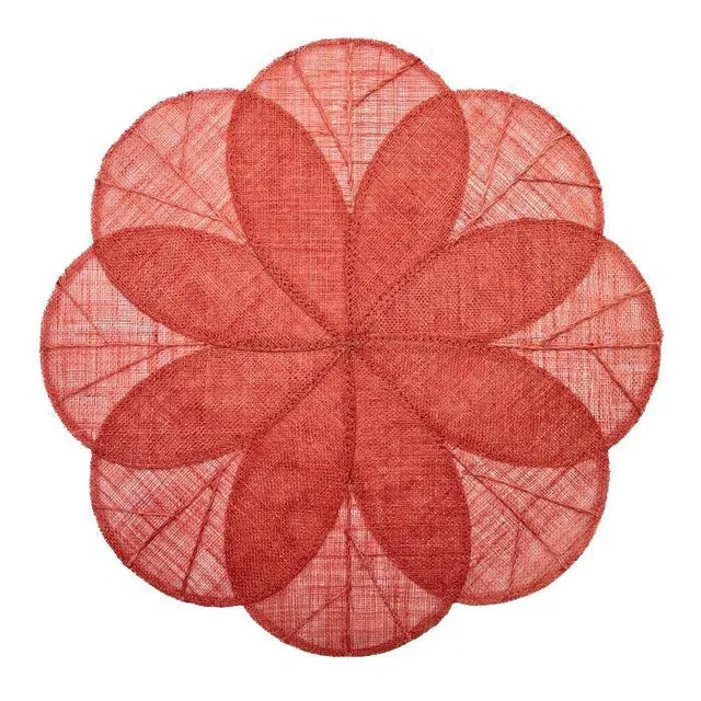A bestseller made of woven abaca fibers, cut and sewn into a sheer floral mat. Great for layering and making a happy...