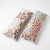 An extra-long lumbar pillow cover set made from hand-embroidered Uzbek Suzani cotton — embroidered tigers, blue birds and...