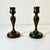 This pair of Early 20th Century hand-turned wood Candle Holders are a part of Americana. They are walnut and feature a...