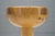 This pine stool from the 1960s was produced in France.