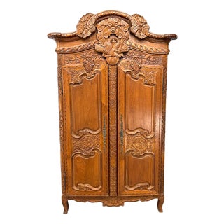 19th Century French Louis XV Carved Armoire With Musical & Floral Motifs For Sale