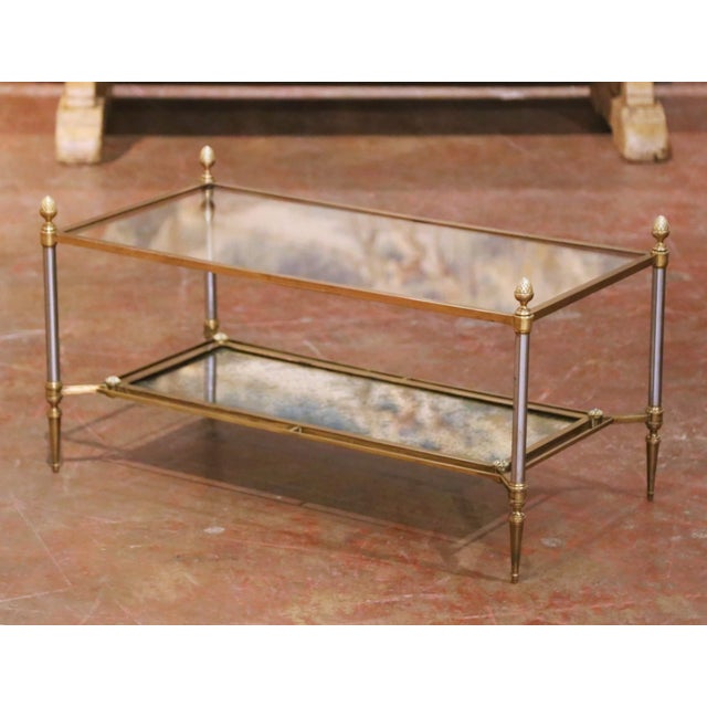 This elegant antique coffee table, crafted in France by Maison Jansen circa 1940, exemplifies the refined neoclassical...