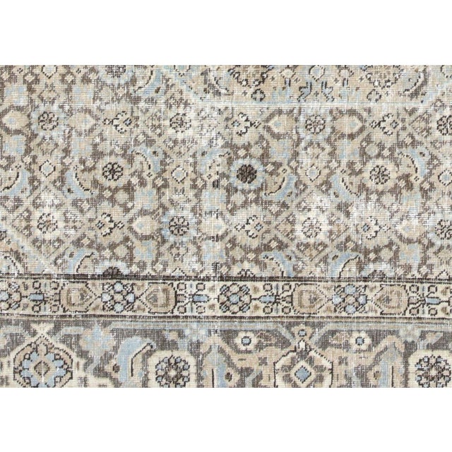 Semi Antique Persian Tabriz Rug, meticulously hand-crafted in Northern Iran's prestigious Tabriz region and expertly...