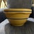 Large Yelloware Pottery Bowl in good condition measuring 11 1/2 inches wide and 6 1/2 inches high. Marked ovenware made in...