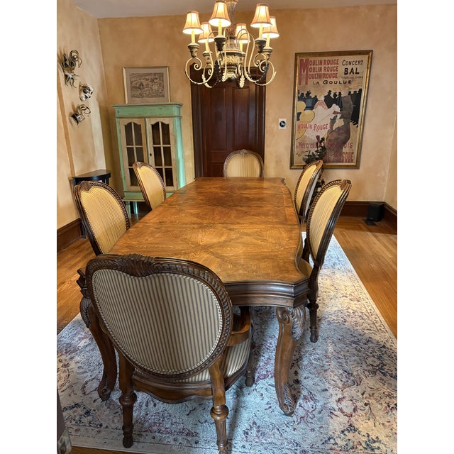 Rectangular Drexel Heritage Dining Room table with extensions. Beautiful inlay pattern and intricate carving on the legs....