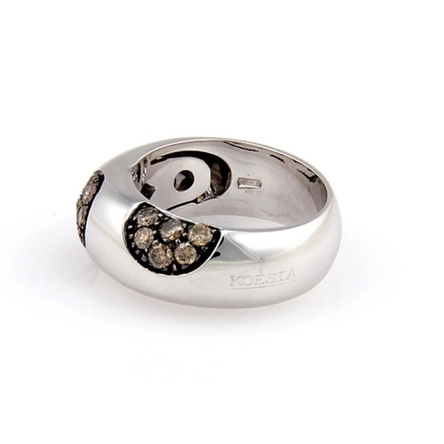 The Koesia Champagne Diamond 18k White Gold Dome Band Ring in size 6.5 is a luxurious and elegant piece of jewelry. Made...