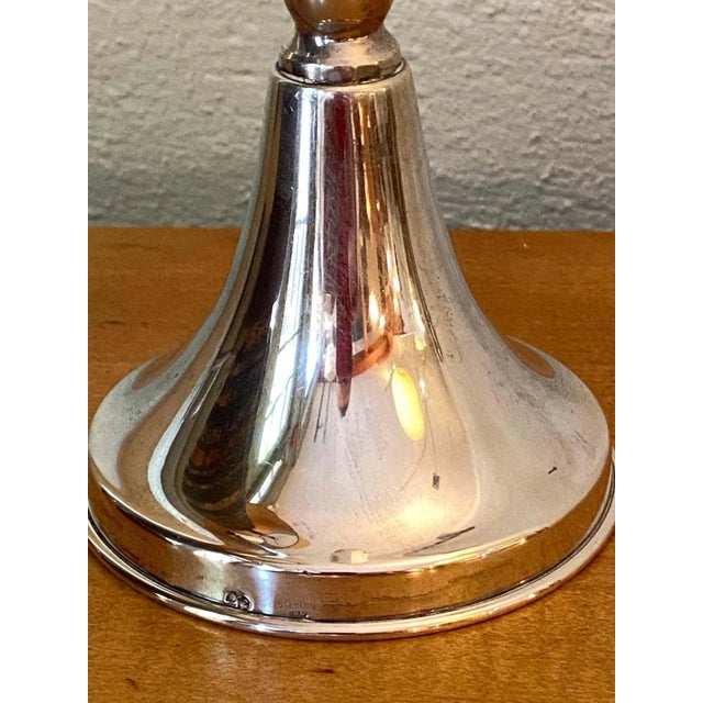 Sterling silver 3 arm candlabra. Very nice quality and design. Marked on rim of base.