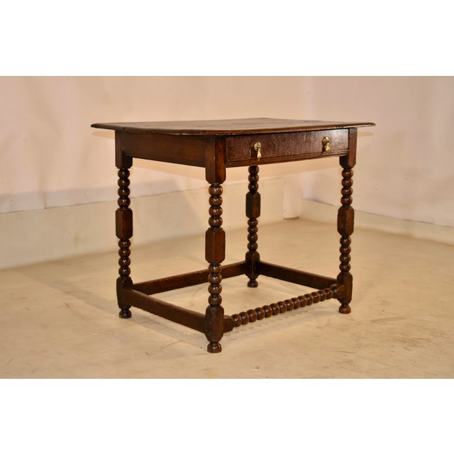 PERIOD Charles I oak side table from England. This is a magnificent and rare side table which dates from about 1640-1650....