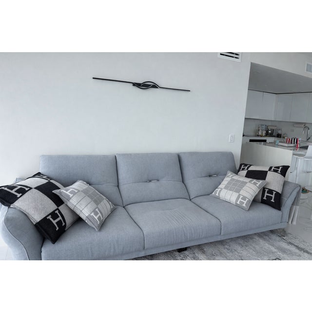 Authentic Roche Bobois Itinéraire sofa upholstered in the original Lift fabric in Perle Grey. This contemporary designer...