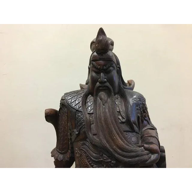 Contemporary wood carving of the first Emperor of China, Qin Shi Huang, founder of the Qin Dynasty. He became Zheng, the...