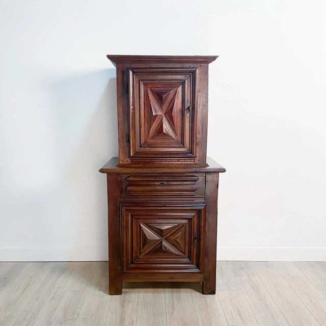 A small early French buffet deux corps, circa 1700.