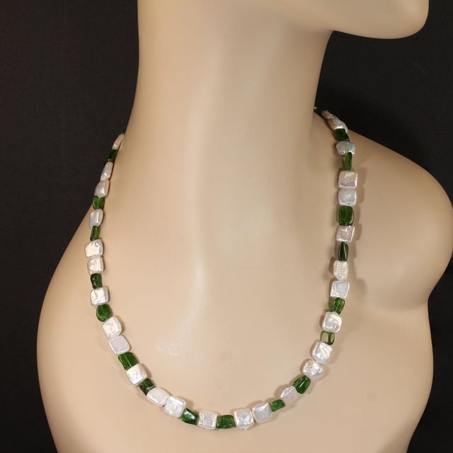 This striking 25‑inch necklace features an eye‑catching arrangement of square white pearls paired with squarish green...
