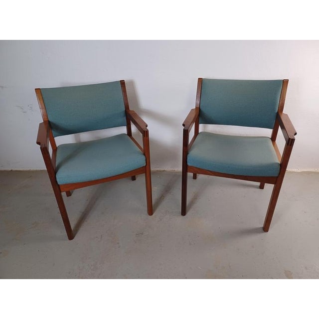 1970s Christian Hvidt Set of two armchairs in mahogany by Søborg Møbelfabrik. The chairs were originally designed by...