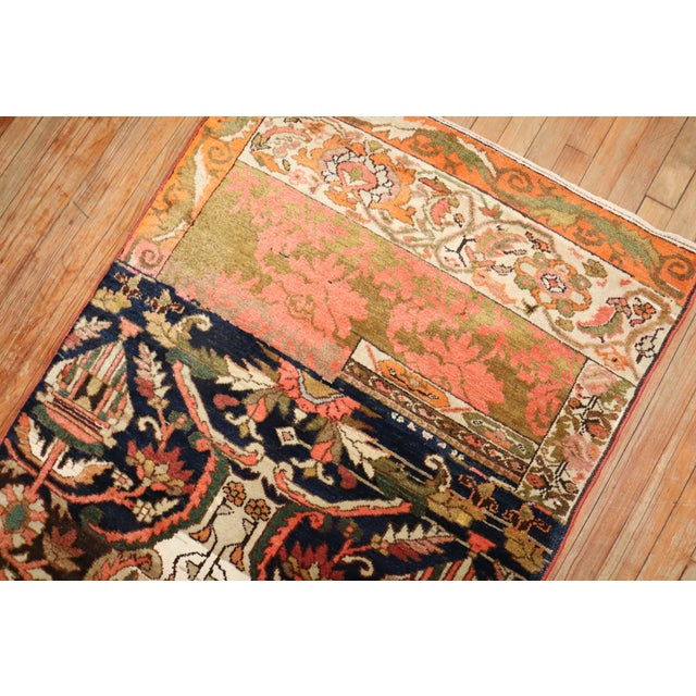 A rare and colorful Persian Bakhtiari sampler (wagireh) rug. Measures: 3'3'' x 4'8''.