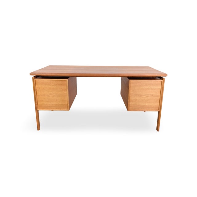 Beautiful vintage danish desk from the 1970s for sale. Designed by gv gaasvig, it impresses with its generous work surface...