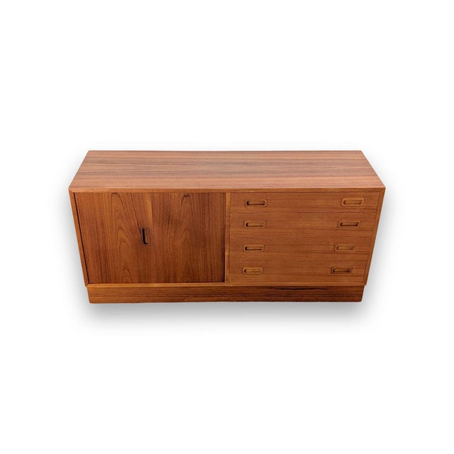 Beautiful mid-century sideboard from the renowned Danish manufacturer Poul Hundevad for sale. Designed by Poul Hundevad...