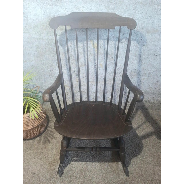 Superb rocking chair by STOL KAMNIK, 1960s Yugoslavia Blackened wood Minor wear, but very good overall condition Seat...