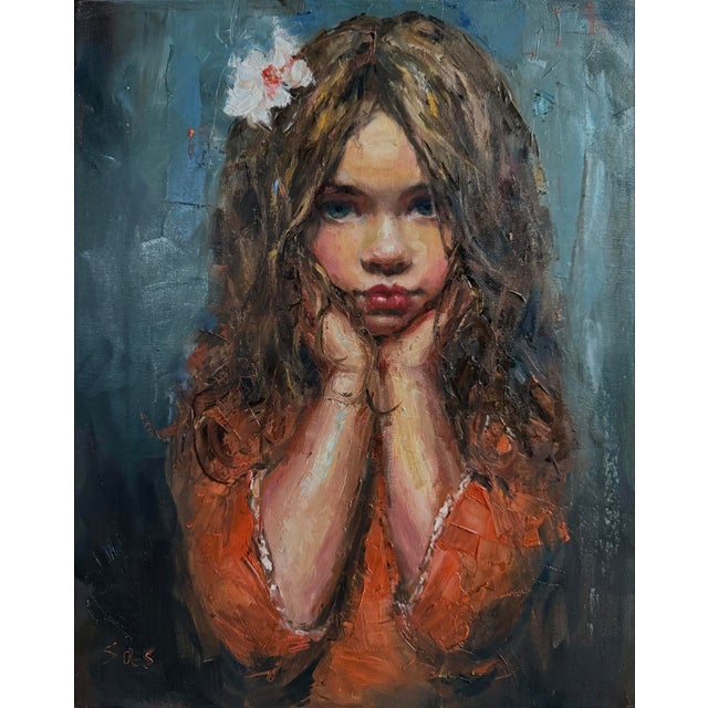 This striking artwork captures the poignant gaze of a young girl, her eyes large and expressive, set against a muted blue...