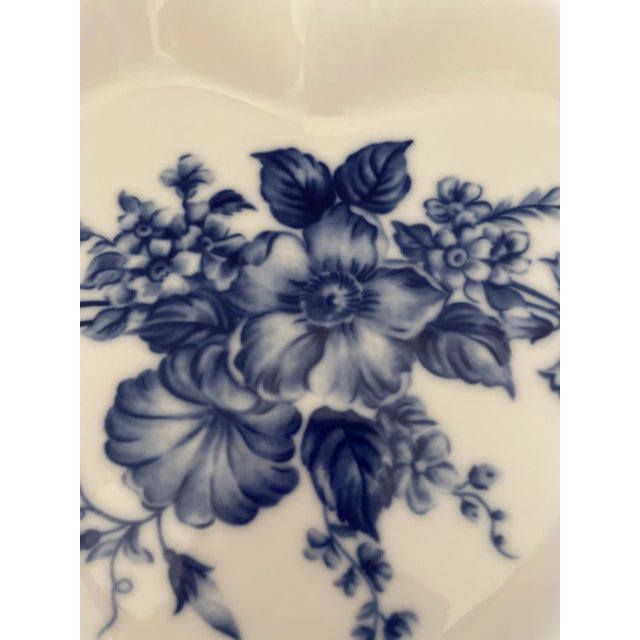 Vintage porcelain blue and white heart shaped serving dishes. These beautiful floral hand painted dishes will add a bit of...