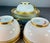 7pc-J.P.Limoges set consisting of 2 cups and 3 saucers. White French porcelain trimmed in black & gold Greek key design....