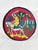 Add a vibrant, artisanal focal point to your seating with this unique vintage round needlepoint accent pillow. Expertly...