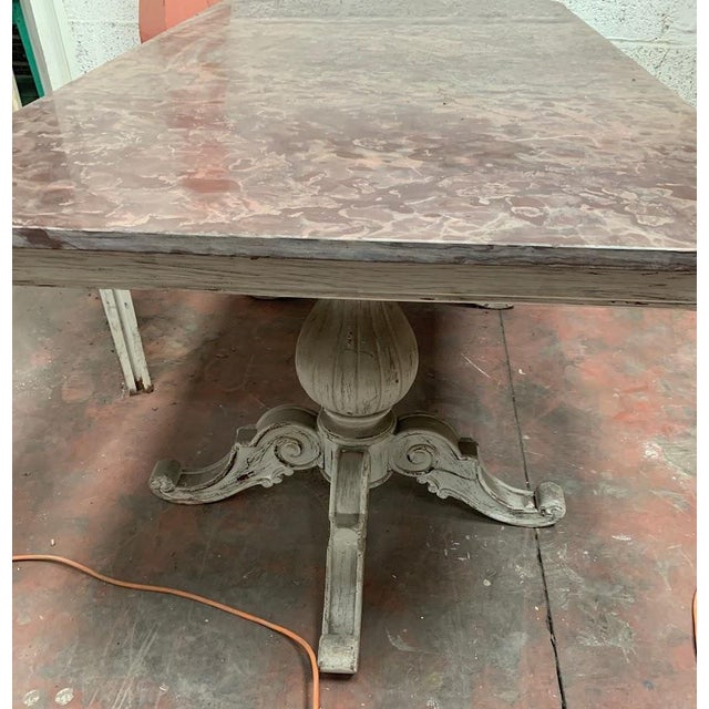 Louis Philippe style painted wood table Two tripod legs with stretchers Breccia marble top Good overall condition...